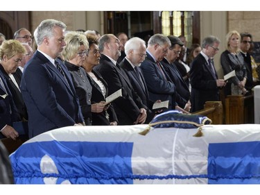 Dignitaries including current Quebec Premier Philippe Couillard attend the funeral of former Quebec premier Jacques Parizeau in Montreal on Tuesday, June 9, 2015.