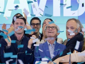 David Segal, left, and Herschel Segal, center, co-founders of David's Tea, celebrate the company's IPO with Sylvain Toutant, right, president and CEO, at the Nasdaq MarketSite, June 5, 2015 in New York.
