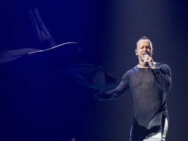 Donnie Wahlberg of New Kids on the Block tosses off his jacket during the band's show at the Bell Centre in Montreal Tuesday, June 30, 2015.