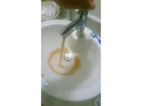 Framegrabs taken from a short video by Bekir Gulpekmez, a Pointe-Claire resident living on Highgate Ave., a street that has been plagued with water problems. The video shows the brown-coloured water that comes out of his  taps.