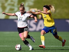 Tabea Kemme of Germany and Elin Rubensson of Sweden battle for the ball during the FIFA Women's World Cup Canada 2015 Round of 16 match between Germany and Sweden at Lansdowne Stadium on June 20, 2015, in Ottawa.