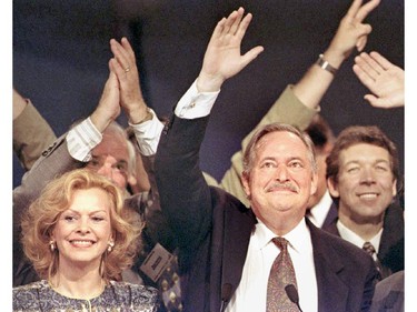 Jacques Parizeau and his wife, Lisette Lapointe, greet supporters in Quebec City September 12, 1994 after the Parti Quebecois's provincial election victory.