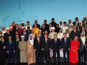 United Nations Secretary-General Ban Ki-moon (front row 7L), Kazakh President Nursultan Nazarbayev (front row 8L), Finland's President Sauli Niinisto (front row 9L) and top religious leaders pose for a family photo during the V Congress of Leaders of World and Traditional Religions in Astana on June 10, 2015.