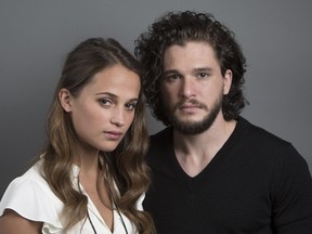 Testament of Youth actors Alicia Vikander and Kit Harington pose for a portrait on Wednesday, June 3, 2015 in New York.