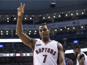 The Raptors' Kyle Lowry gestures during first half of NBA game against the Philadelphia 76ers in Toronto on Jan. 14, 2015.