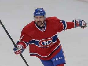 Montreal Canadiens centre Tomas Plekanec celebrates scoring the Canadiens third goal against the Tampa Bay Lightning during the third period of their third NHL Eastern Conference quarterfinal playoff game at the Bell Centre in Montreal on Sunday, April 20, 2014.