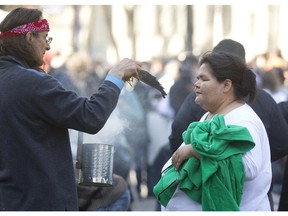 Marchers participate in a ceremony before a procession to start  the first day of the Truth and Reconciliation Commission into the Indian Residential School system, Quebec, April 24, 2013.