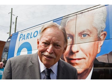 Former Quebec Premier Jacques Parizeau walks back to his car after speaking at a rally with Bloc Quebecois leader Gilles Duceppe at an auto-shop in Lonqueil, south of Montreal on Monday, April 25, 2011. Recent polls for the May 2 federal elections have shown the Bloc Quebecois losing ground to the NDP in Quebec.
