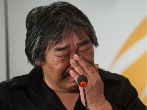 Residential school survivor Taati Airo reacts as he gets emotional during his testimony at the Truth and Reconciliation Commission into residential schools in Montreal April 26, 2013.