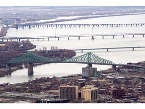 MONTREAL, QUE.: APRIL 26, 2015 -- An aerial view of the Montreal area bridges in Montreal, Sunday, April 26, 2015.  From bottom to top are: the Jacques Cartier bridge, the Pont de la Concorde, Victoria bridge and the Champlain bridge. (John Kenney / MONTREAL GAZETTE)