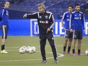 Impact coach Frank Klopas gives instructions during practice at training camp in Montreal on Jan. 23, 2015.