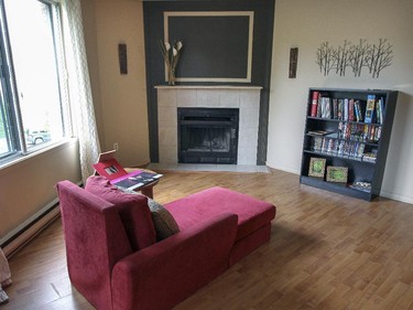 A sitting area in front of the fireplace in Ali Benryane's apartment in Little Burgundy.