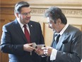 U.S. actor Al Pacino, right, receives the key to the city by Montreal mayor Denis Coderre on Sunday June 07, 2015 at city hall. Pacino was at city hall to sign the book and receive the key to the city.