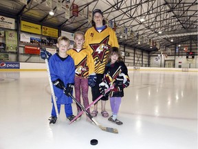 Marie Rennie with her children Braden, Adeline and Gracie at the St-Lazare Sports Complex.  St-Lazare's new sports funding formula will mean higher costs for her family.