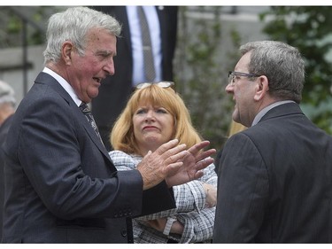 Former Montreal mayor Pierre Bourque, left and Quebec mayor Regis Labeaume prior to the state funeral of former Quebec Premier Jacques Parizeau held in Montreal on Tuesday June 09, 2015.