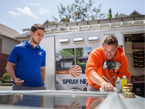 Carmelo Marsala, left, founder of the company Spray-Net, speaks with Spray-Net employee Olivier Nicolas at one of their residential jobs in St-Lambert on Thursday, June 11, 2015.