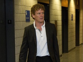 Former Outremont mayor Stéphane Harbour enters the courtroom for his sentencing in fraud scandal, at the Palais de Justice in Montreal, Friday June 12, 2015. Harbour has pleaded guilty to fraud of $2,000 from the city.