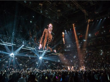 Irish rock band U2 performs at the Bell Centre as part of their iNNOCENCE + eXPERIENCE Tour in Montreal on Friday, June 12, 2015.