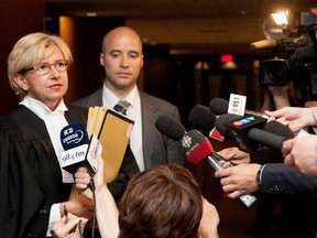 Crown prosecutor Lyne Décarie addresses reporters after the bail hearing for Sabrine Djermane and El Mahdi Jamali in June 2015.
