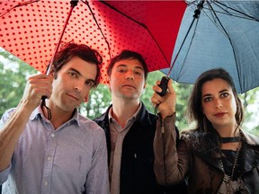 Left to right: Brad Barr, Andrew Barr and Sarah Pagé of the Montreal band Barr Brothers pose for a photograph in Montreal on Tuesday, June 16, 2015. The band will be performing a large free outdoor show for the Montreal International Jazz Festival on Tuesday.