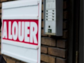 MONTREAL, QUE.: JUNE 18, 2014-- Nikki Middlemiss had a business scouting apartments for students, until the Quebec Real Estate Agents Association said she was doing realtors' work and forced her to close. Middlemiss stands near one of many rental units in the McGill Ghetto area of Montreal on Wednesday June 18, 2014.  (Allen McInnis / THE GAZETTE)  ORG XMIT: 50263