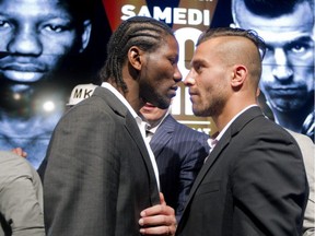 MONTREAL, QUE.: JUNE 18, 2015 -- Boxers Hassan N'Dam, left, and Quebec's David Lemieux face each other during a press conference in Montreal, Thursday June 18, 2015, to promote their IBF world middleweight championship bout at the Bell Centre on Saturday June 20.  (Phil Carpenter / MONTREAL GAZETTE)