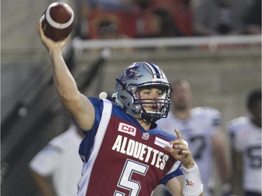 Alouettes quarterback Dan LeFevour, throws a pass against the Toronto Argonauts during pre-season CFL football action in Montreal on Thursday, June 18, 2015.
