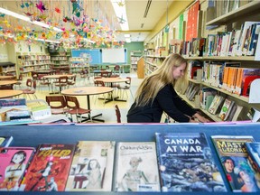 Librarian Kathy Conroy at the library of the Westwood Jr. School in St-Lazare,  is one of 18 librarians who will be losing their positions due to budget cuts.