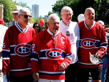 Former Canadiens Rejean Houle, left, Yvan Cournoyer, Dr. David Mulder and Sergio Momesso take part in the Walk for Montreal to inaugurate the new MUHC Glen site in Montreal on Saturday June 20, 2015.