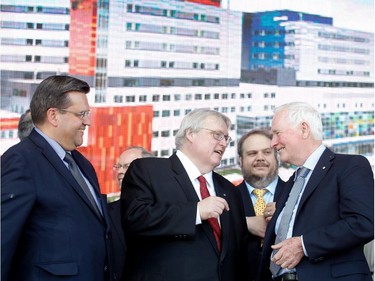 Montreal Mayor Denis Coderre, left, Quebec Health Minister Gaétan Barrette and David Johnston, governor general of Canada speak after cutting the official ribbon to inaugurate the new MUHC Glen site in Montreal on Saturday June 20, 2015. Benoît Dorais, mayor of the South West borough looks on.