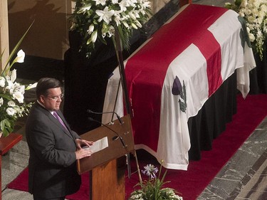 Montreal mayor Denis Coderre speaks during the funeral of former mayor Jean Doré, during the service at Montreal city hall on Monday June 22, 2015.