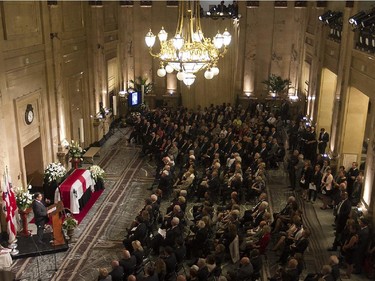 Montreal mayor Denis Coderre speaks during the funeral of former mayor Jean Doré, during the service at Montreal city hall on Monday June 22, 2015.