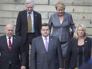 Montreal mayor Denis Coderre, centre front, is flanked by Quebec ministers Lise Thériault and Robert Poeti, while former Quebec premier Pauline Marois and former minister Serge Ménard walk down behind them. The group was attending the funeral services of former Montreal mayor Jean Doré. The service was held at city hall in  Montreal on Monday June 22, 2015.