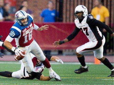 Montreal Alouettes quarterback Jonathan Crompton is sacked by the Ottawa Redblacks during CFL action at the Percival Molson Stadium in Montreal on Thursday June 25, 2015.