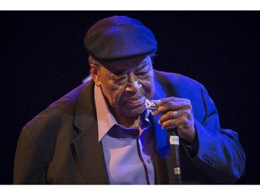 MONTREAL, QUE.: JUNE 27, 2015 --  Legendary blues musician James Cotton enters the stage at Place des Arts during The Montreal International Jazz Festival in Montreal, on Saturday, June 27, 2015. (Peter McCabe / MONTREAL GAZETTE)