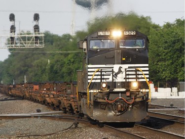 A Norfolk Southern engines pulls freight cars near Chesterton, Ind.