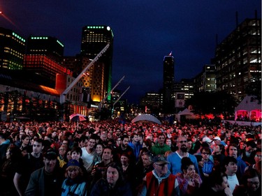 A large crowd waits for The Barr Brothers to perform as part of the Montreal International Jazz Festival in Montreal on Tuesday June 30, 2015.