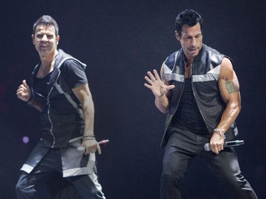 New Kids on the Block members Danny Wood (right) and Jordan Knight put on some moves at the Bell Centre in Montreal Tuesday, June 30, 2015.