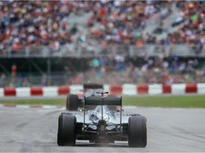 Mercedes driver Lewis Hamilton of Great Britain exits the pits during the second practice session for the Canadian Grand Prix at Circuit Gilles Villeneuve in Montreal on June 5, 2015.