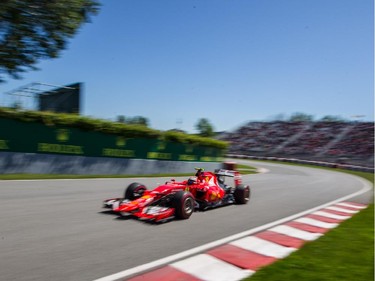Ferrari Formula 1 driver Kimi Raikkonen of Finland exits turn three during the third practice session for the F1 Canadian Grand Prix at Circuit Gilles-Villeneuve in Montreal on Saturday, June 6, 2015.