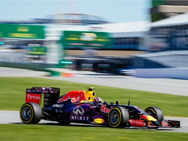 Red Bull Formula 1 driver Daniil Kvyat of Russia takes turn three during the third practice session for the F1 Canadian Grand Prix at Circuit Gilles-Villeneuve in Montreal on Saturday, June 6, 2015.