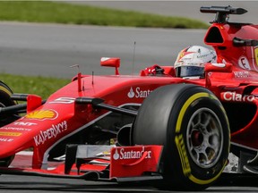 Ferrari driver Sebastian Vettel of Germany takes Turn 3 during the Canadian Grand Prix at Circuit Gilles Villeneuve in Montreal on June 7, 2015.
