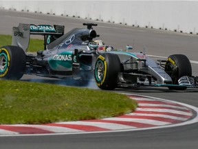 Mercedes driver Lewis Hamilton of Great Britain brakes as he takes Turn 3 during the Canadian Grand Prix at Circuit Gilles Villeneuve in Montreal on June 7, 2015.