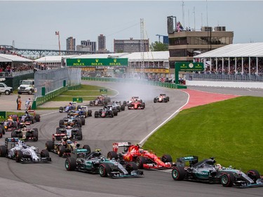 Mercedes Formula 1 driver Lewis Hamilton of Great Britain enters turn two followed by other drivers at the start of the Canadian Grand Prix at Circuit Gilles-Villeneuve in Montreal on Sunday, June 7, 2015.
