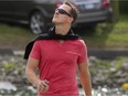 Formula One driver Michael Schumacher arrives for morning practice at Circuit Gilles Villeneuve on June 8, 2012 ahead of the Canadian Grand Prix.