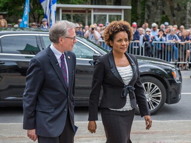 Former  Governor General of Canada Michaëlle Jean, right, arrives for the funeral for former Quebec premier Jacques Parizeau at Saint-Germain d'Outremont Church in Montreal on Tuesday, June 9, 2015.