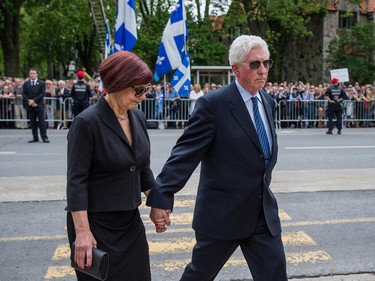 Former leader of the Bloc Québécois Gilles Duceppe, right, arrives with his wife Yolande Brunelle, left, for the funeral for former Quebec premier Jacques Parizeau at Saint-Germain d'Outremont Church in Montreal on Tuesday, June 9, 2015.