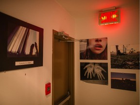 Photographs displayed outside LOVE's Montreal offices. The organization's goal is to reduce violence in the lives of young people by promoting self-expression.