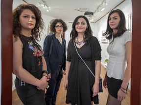 Artists Nazanin Afshar, left, Maryam Izadifard, Ronak Kordestani Mehrnaz and Tanbakoosaz at Galerie Mekic in Montreal, on Friday, May 29, 2015.