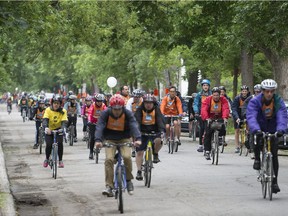 Tour de l'Île cyclists make their way through Ville Emard.